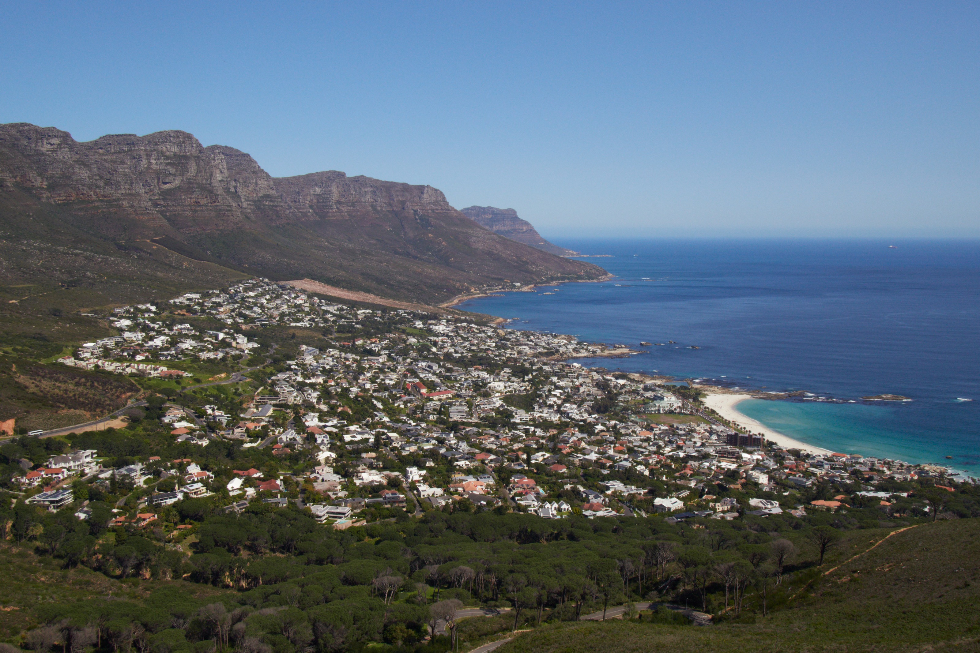 Stock aerial view of Camps Bay, the Twelve Apostles and the Atlantic coastline, by lumoplank